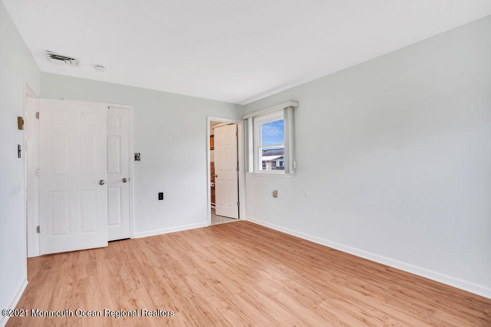 54 Markham Road Brick, NJ 08724 - Photo 29 of 35 a view of empty room with wooden floor