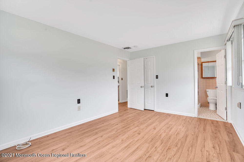 54 Markham Road Brick, NJ 08724 - Photo 30 of 35 a view of empty room with wooden floor