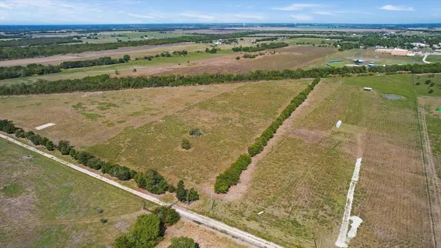 a view of a city and mountains in the background