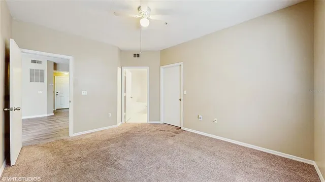 an empty room with a bathroom