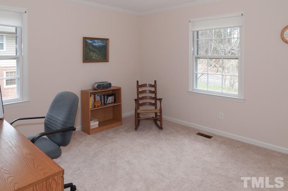 1445 Princess Anne Road Raleigh, NC 27607 - Photo 16 of 25 a view of a workspace with furniture and a window