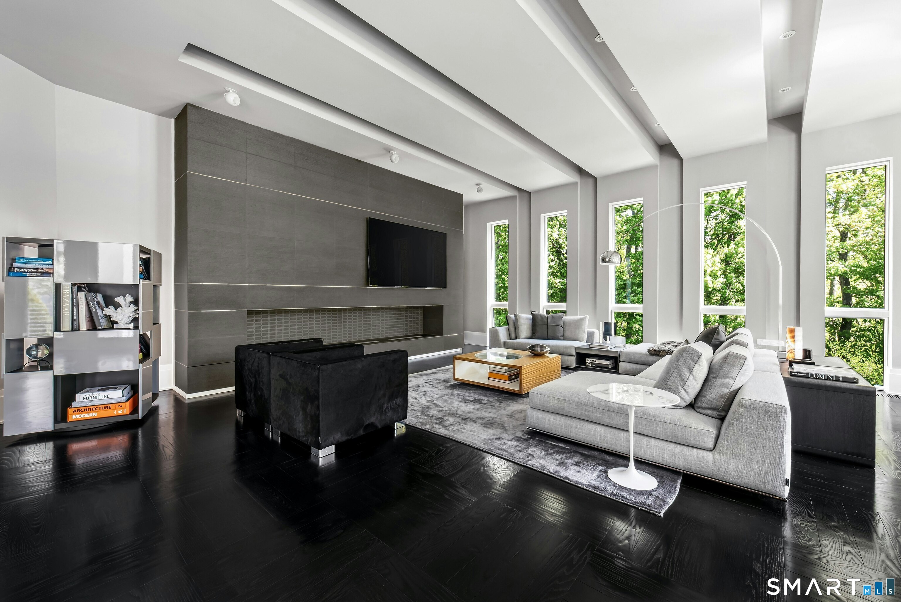 300 Sturges Ridge Road Wilton, CT 06897 - Photo 22 of 40 a living room with fireplace furniture and a flat screen tv