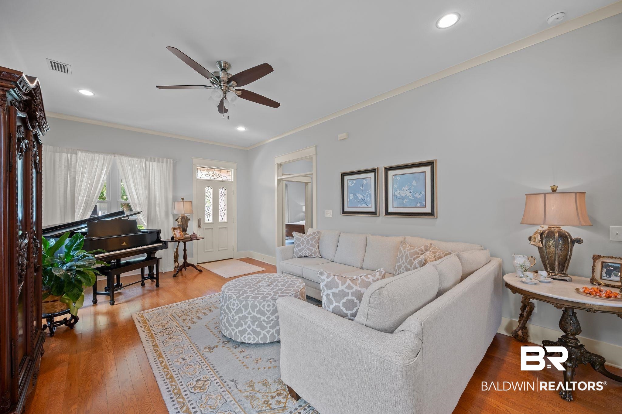 905 Buttercup Lane Foley, AL 36535 - Photo 14 of 47 Living area with crown molding, ceiling fan, wood finished floors, and recessed lighting