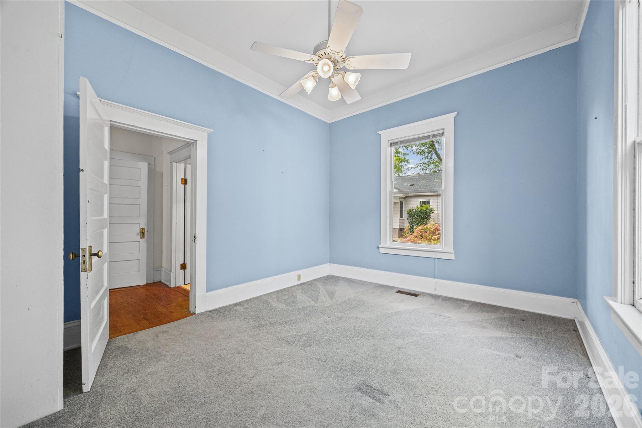 202 Pressley Street Clover, SC 29710 - Photo 13 of 26 a view of an empty room with a window