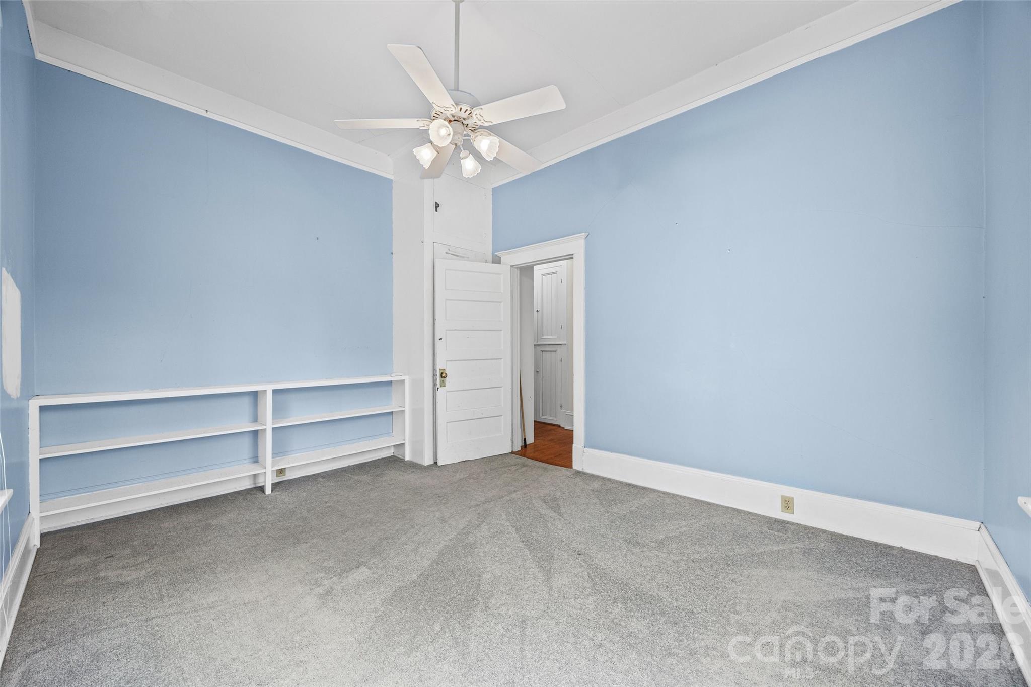 202 Pressley Street Clover, SC 29710 - Photo 14 of 26 an empty room with chandelier fan