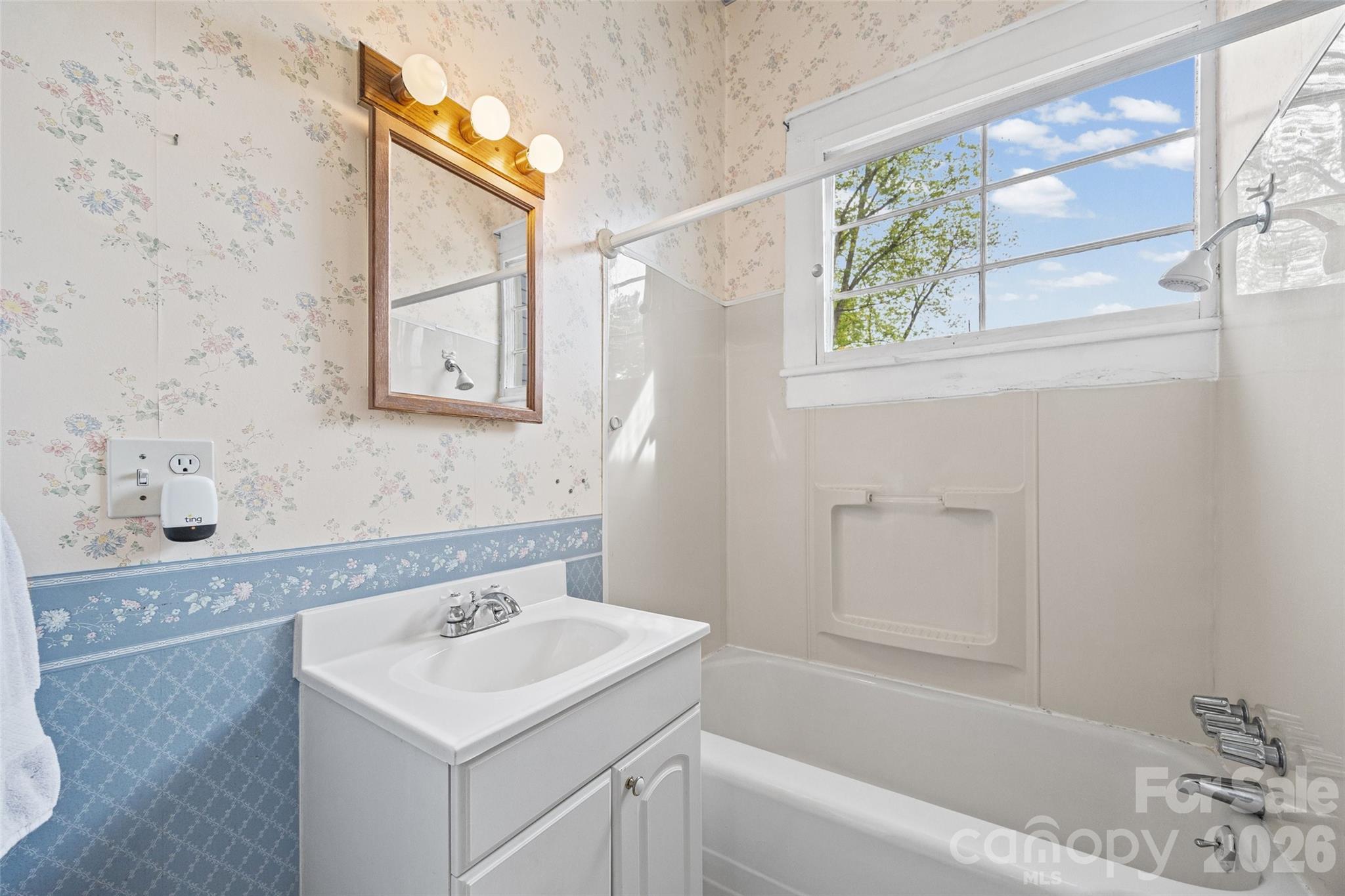 202 Pressley Street Clover, SC 29710 - Photo 15 of 26 a bathroom with a sink and a bathtub