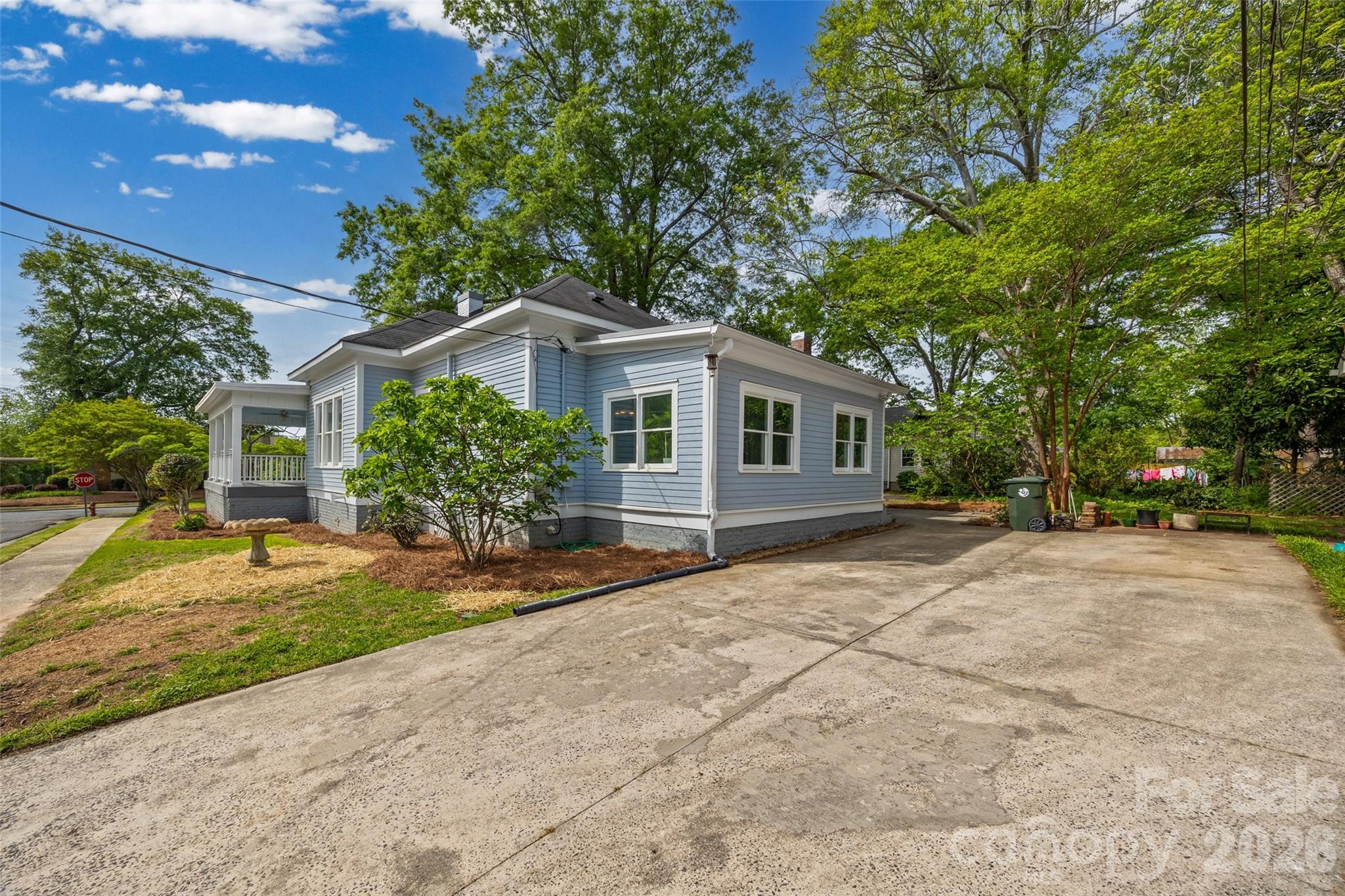 202 Pressley Street Clover, SC 29710 - Photo 23 of 26 a front view of a house with a yard and a garage