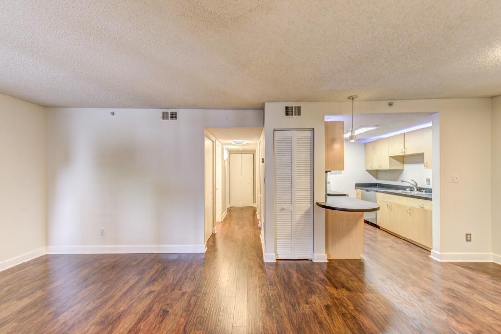 381 Ralph McGill Boulevard Northeast, Unit E Atlanta, GA 30312 - Photo 1 of 27 a view of open kitchen with wooden floor and a sink