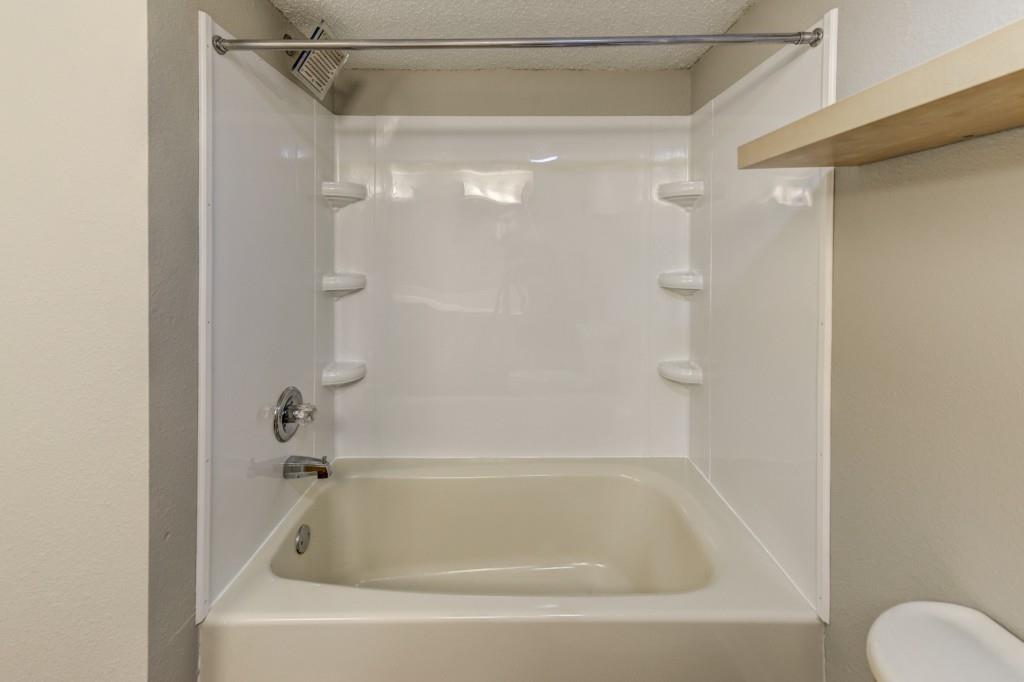 381 Ralph McGill Boulevard Northeast, Unit E Atlanta, GA 30312 - Photo 14 of 27 a close view of a bathtub in bathroom