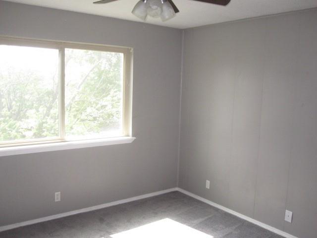 2801 Pyramid Circle Denison, TX 75020 - Photo 12 of 18 an empty room with a window