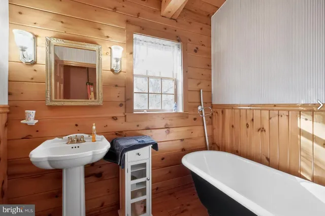a bathroom with a sink and a bathtub