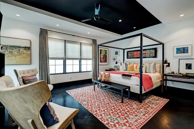 a bed room with furniture and a window