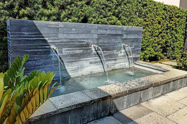 a view of a backyard with sitting area
