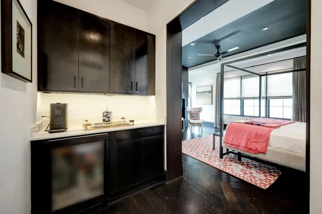 a living room with furniture fireplace and flat screen tv