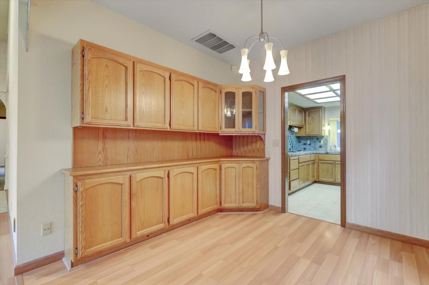 5316 Engle Road Carmichael, CA 95608 - Photo 12 of 47 a view of a kitchen with dishwasher cabinet and a fireplace
