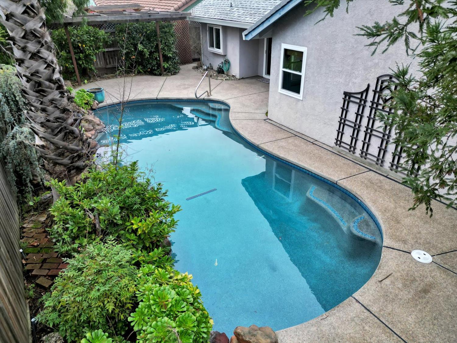 5316 Engle Road Carmichael, CA 95608 - Photo 24 of 47 a view of a swimming pool with a patio