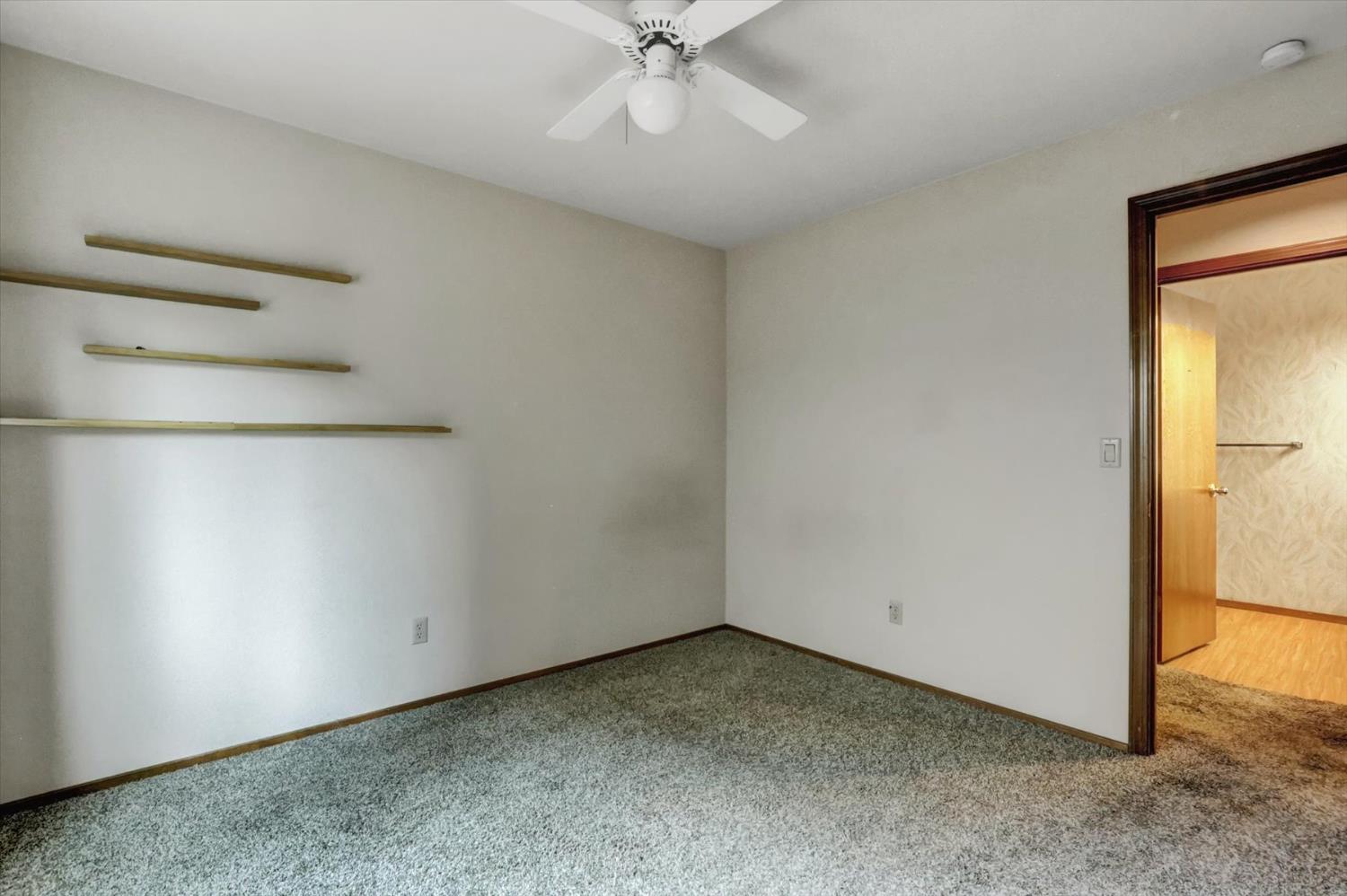 5316 Engle Road Carmichael, CA 95608 - Photo 43 of 47 a view of an empty room with a ceiling fan