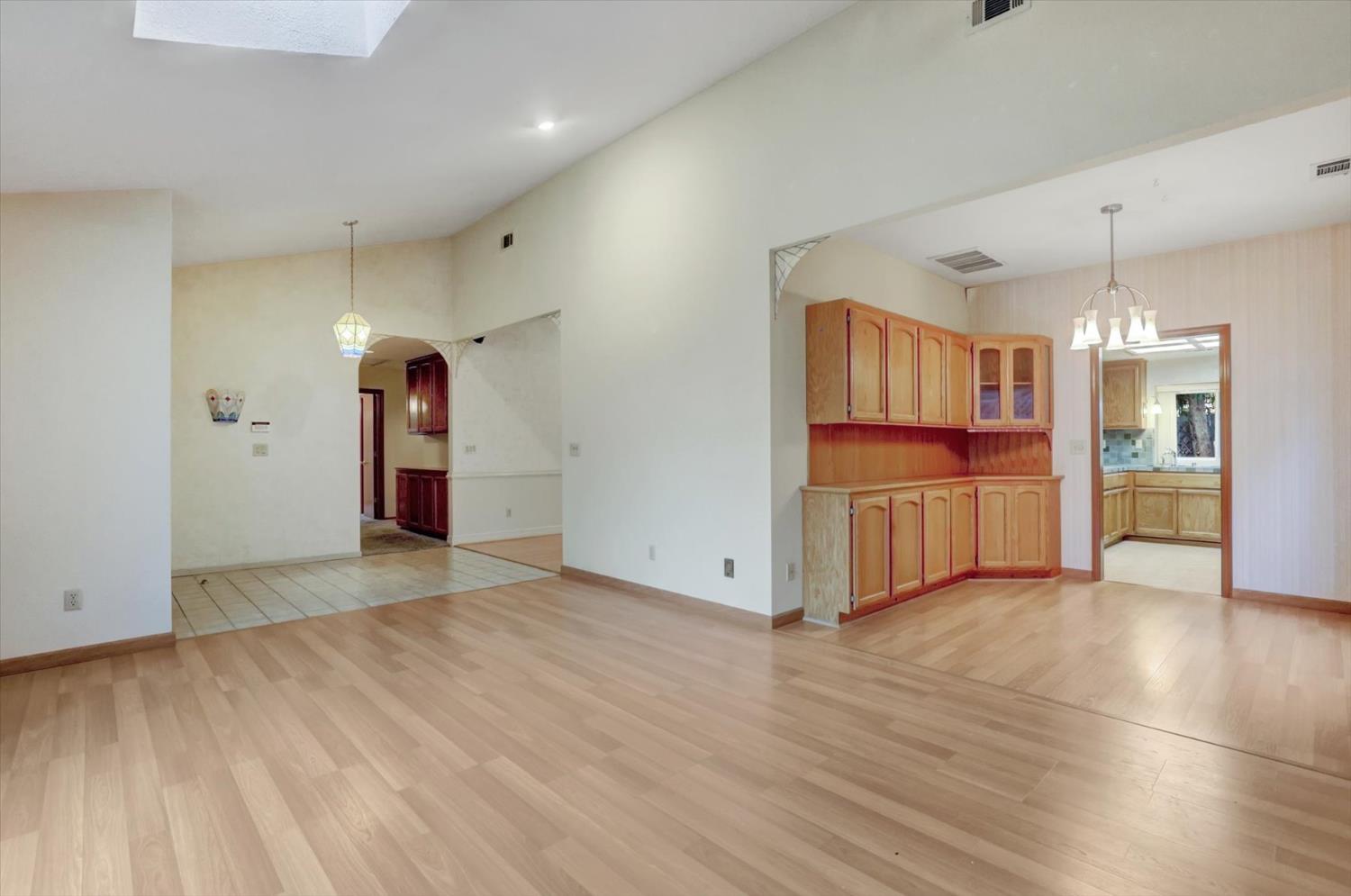 5316 Engle Road Carmichael, CA 95608 - Photo 10 of 47 a view of an empty room with kitchen and a window