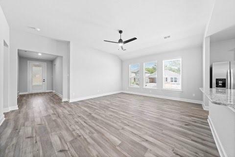 2004 Hardwick Drive Anna, TX 75409 - Photo 6 of 18 wooden floor in an empty room with a window