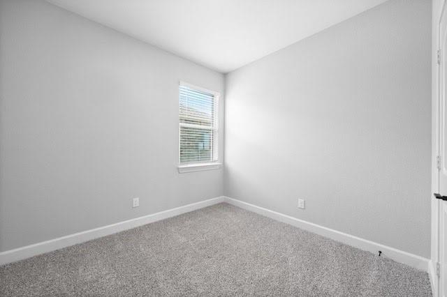 2004 Hardwick Drive Anna, TX 75409 - Photo 7 of 18 an empty room with windows