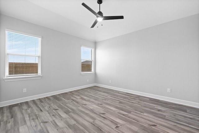 2004 Hardwick Drive Anna, TX 75409 - Photo 8 of 18 wooden floor in an empty room with a window