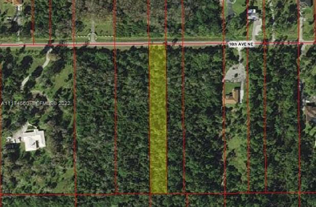 2580 16th Avenue Northeast Naples, FL 34120 - Photo 1 of 1 a view of a forest with a building
