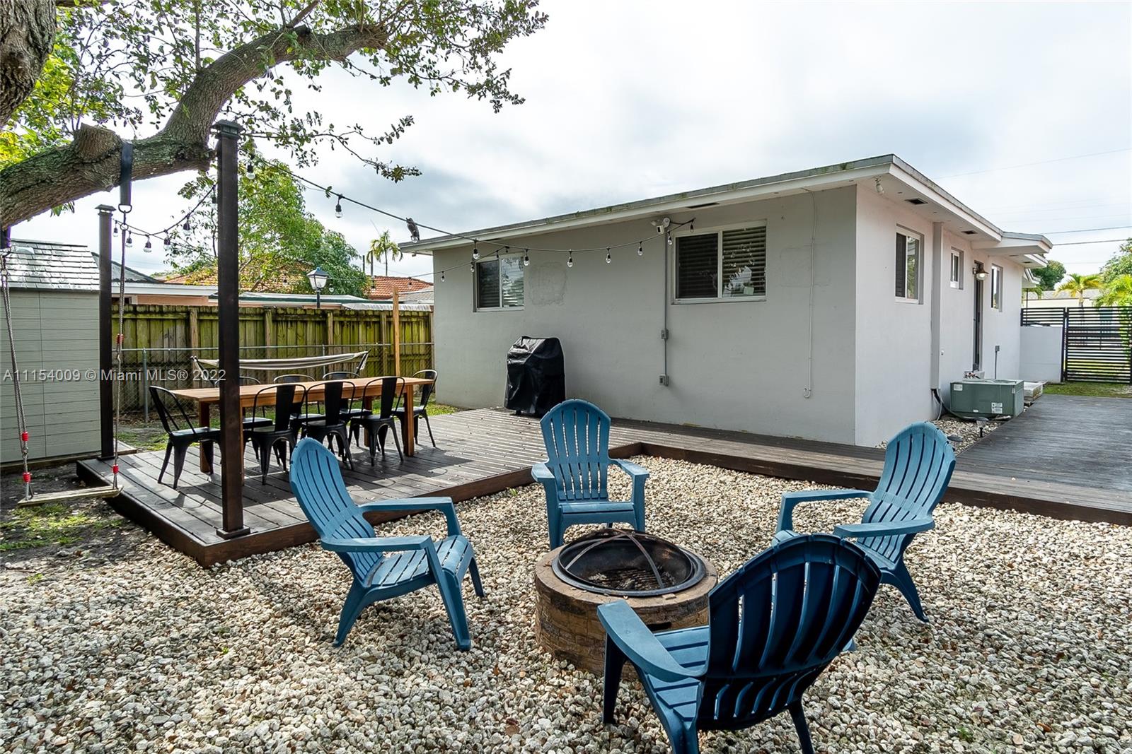 4235 East 9th Lane Hialeah, FL 33013 - Photo 30 of 34 a view of a patio with iron fence