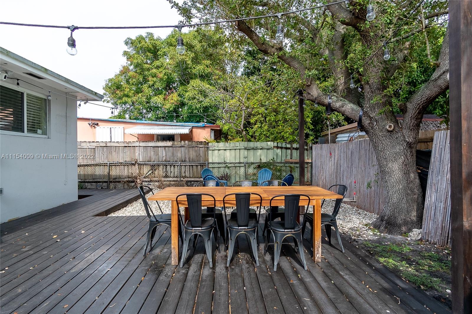4235 East 9th Lane Hialeah, FL 33013 - Photo 33 of 34 a outdoor view with a sitting space