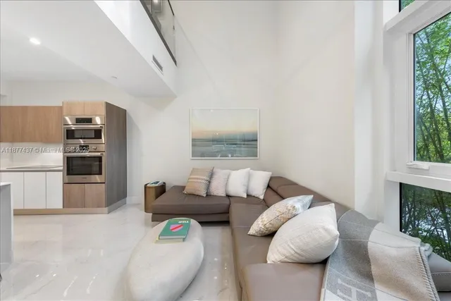 a living room with furniture and a couch