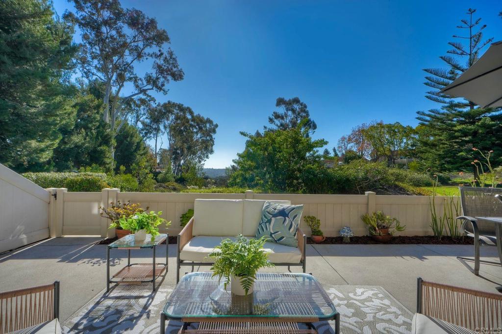 220 Shorehang Lane Encinitas, CA 92024 - Photo 19 of 27 a view of a couches and table in the patio