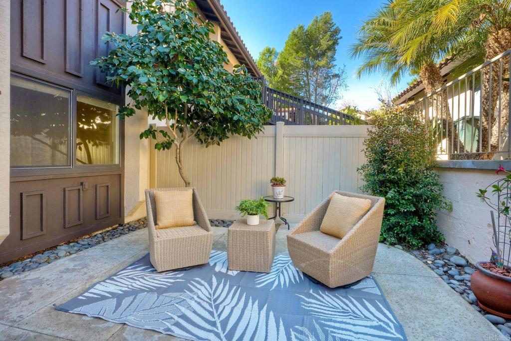 220 Shorehang Lane Encinitas, CA 92024 - Photo 4 of 27 a view of a patio with couches and potted plants