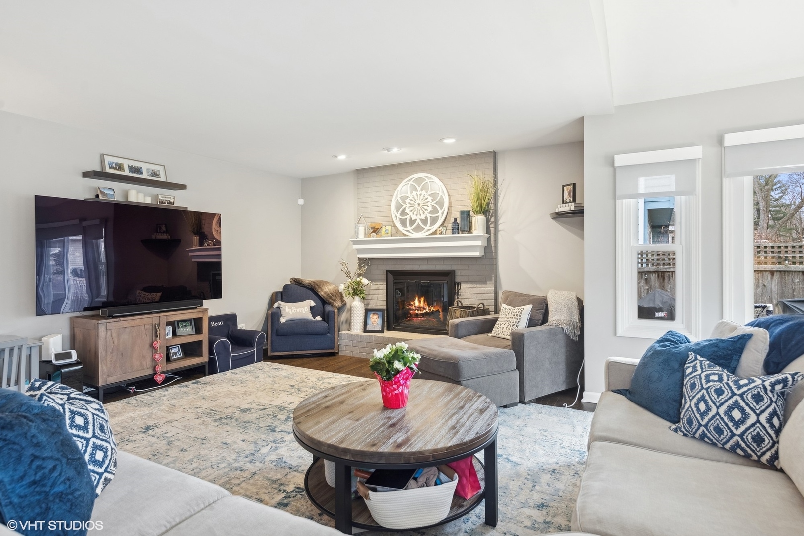 41 Swift Lane Naperville, IL 60565 - Photo 11 of 25 a living room with furniture and a flat screen tv