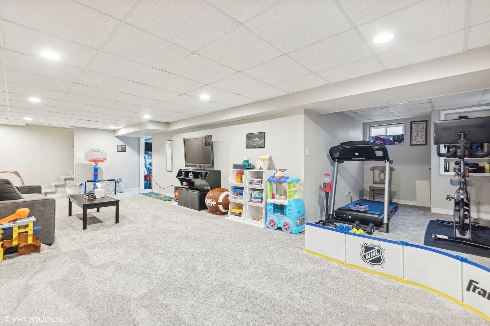 41 Swift Lane Naperville, IL 60565 - Photo 18 of 25 a view of a room with gym equipment