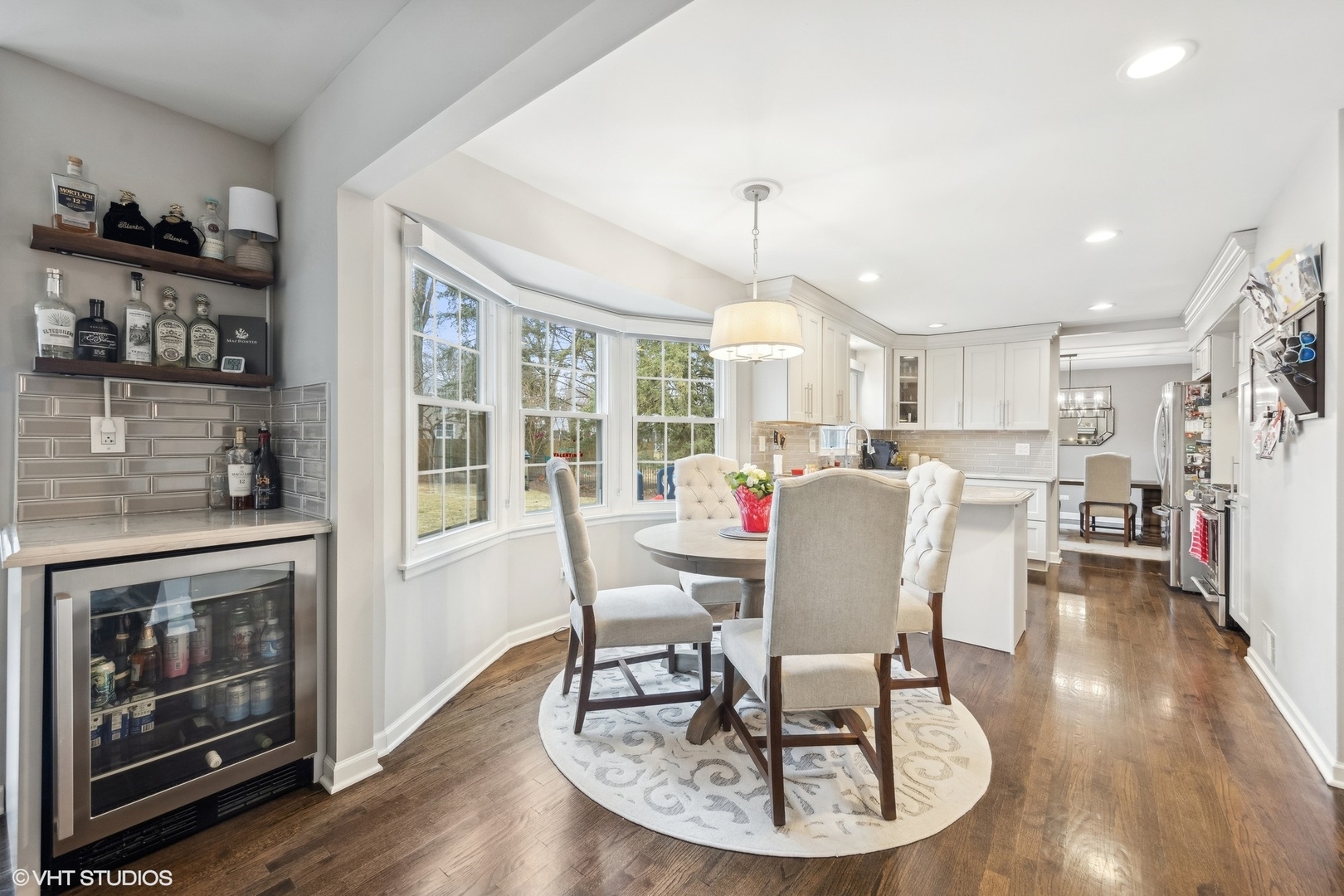 41 Swift Lane Naperville, IL 60565 - Photo 8 of 25 a view of a dining room with furniture window and wooden floor