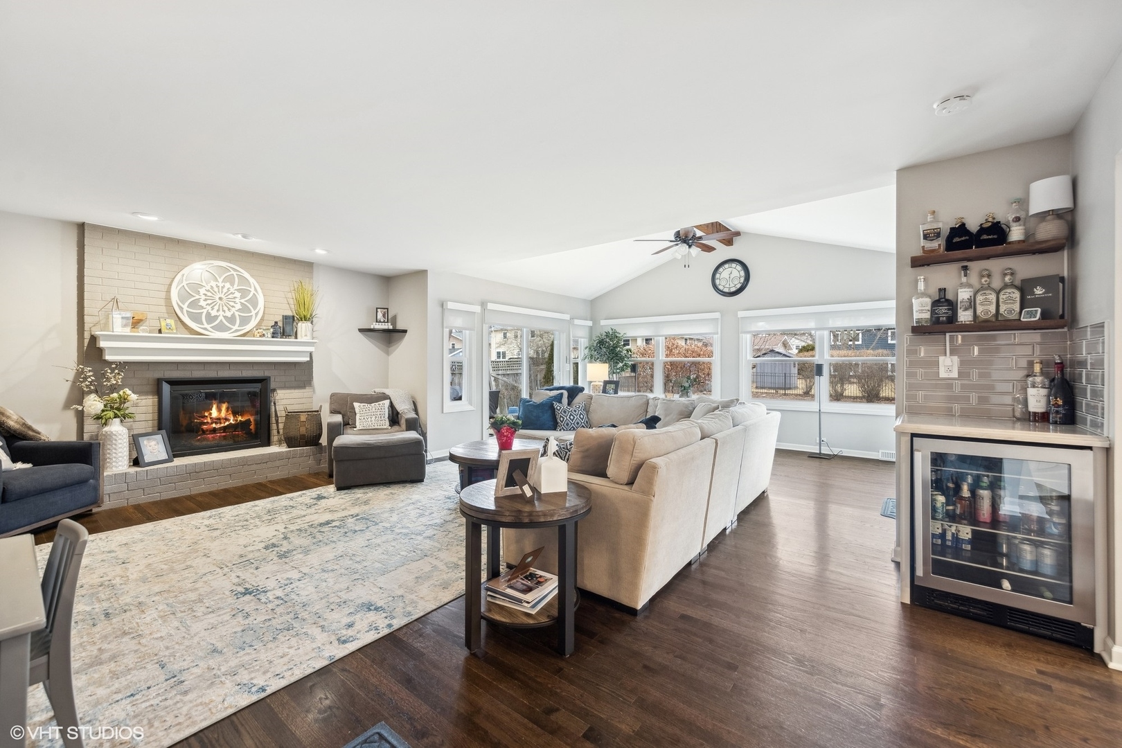 41 Swift Lane Naperville, IL 60565 - Photo 9 of 25 a living room with furniture and a fireplace
