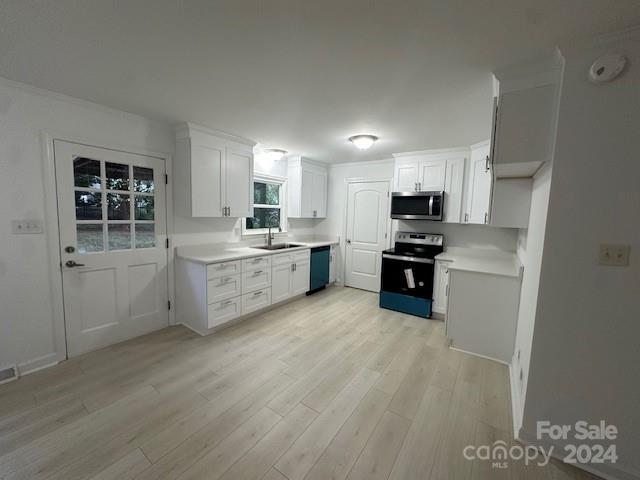 5052 Suwarrow Court Fort Mill, SC 29708 - Photo 2 of 9 a kitchen with stainless steel appliances a refrigerator sink and cabinets