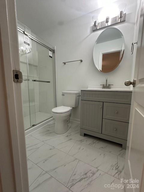 5052 Suwarrow Court Fort Mill, SC 29708 - Photo 8 of 9 a bathroom with a toilet sink and mirror