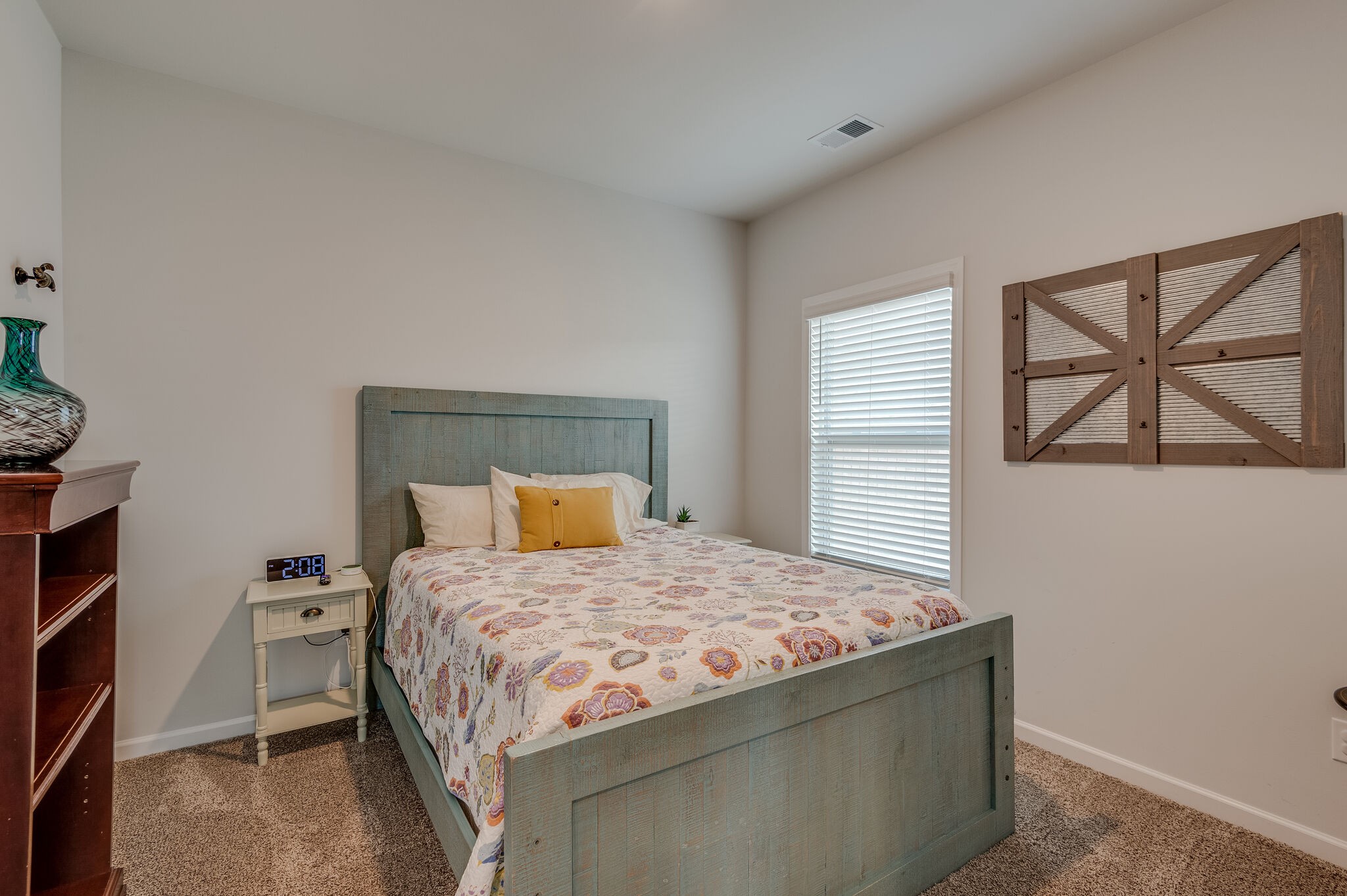 9003 Lockeland Drive Spring Hill, TN 37174 - Photo 11 of 16 a bedroom with a bed and a window