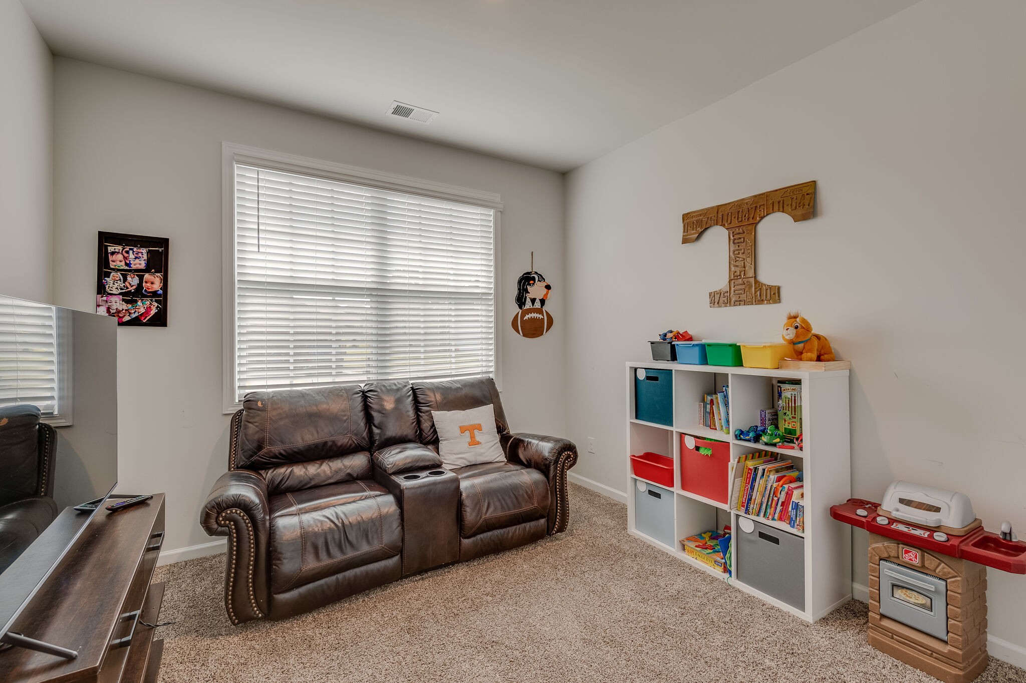 9003 Lockeland Drive Spring Hill, TN 37174 - Photo 13 of 16 a living room with furniture and a window