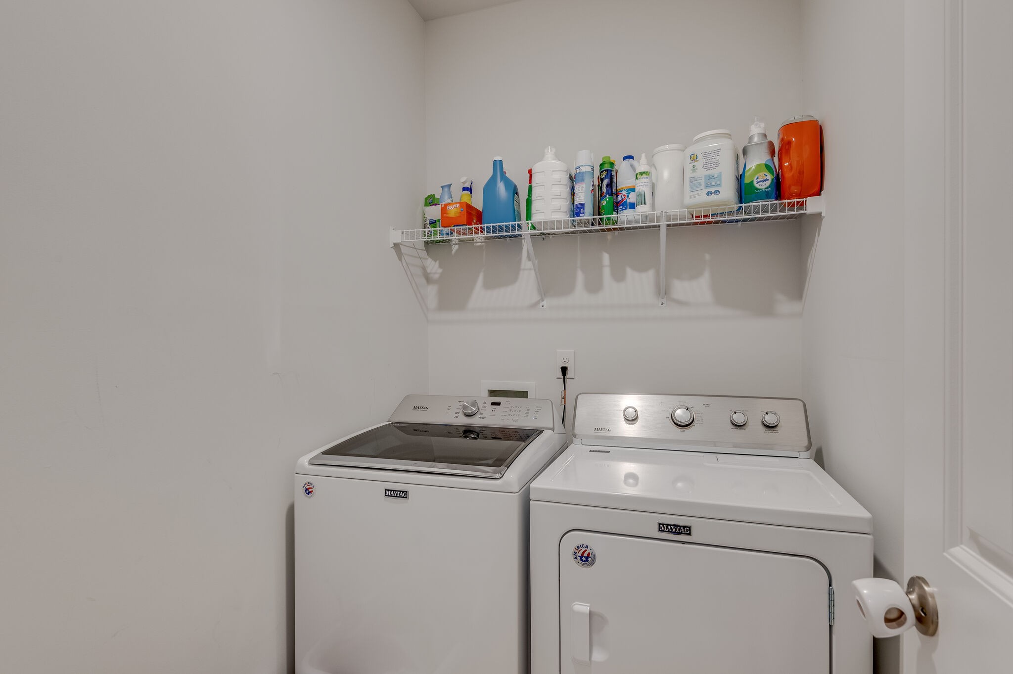 9003 Lockeland Drive Spring Hill, TN 37174 - Photo 14 of 16 a utility room with dryer and washer
