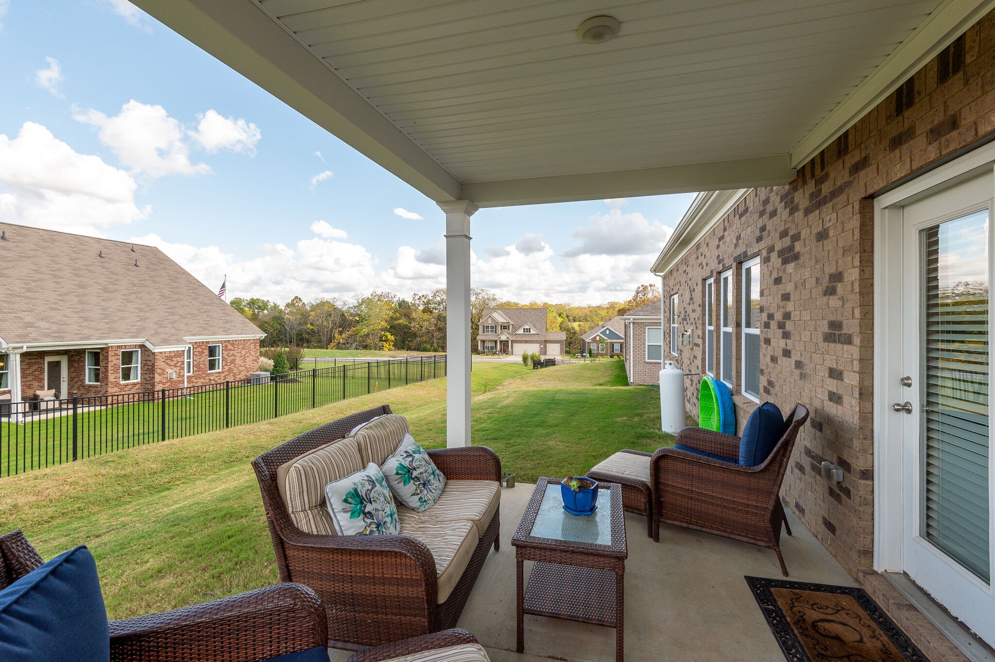 9003 Lockeland Drive Spring Hill, TN 37174 - Photo 15 of 16 a view of a patio with couches chairs and a yard