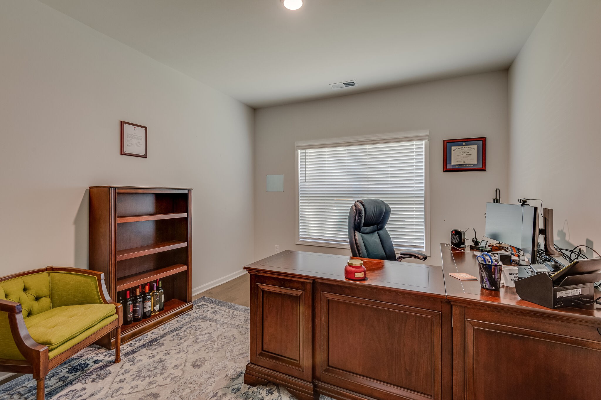 9003 Lockeland Drive Spring Hill, TN 37174 - Photo 4 of 16 a living room with furniture and a flat screen tv
