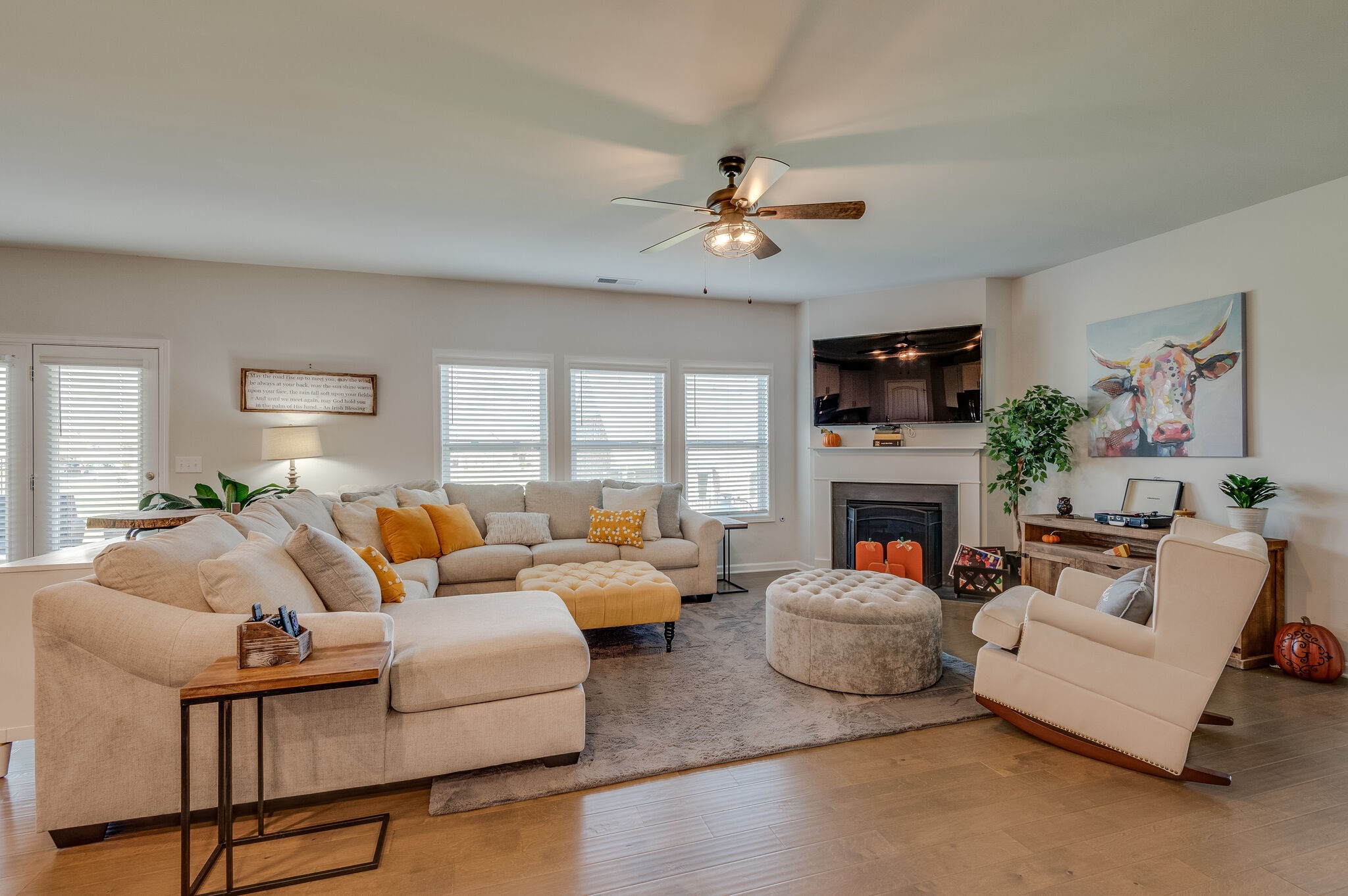 9003 Lockeland Drive Spring Hill, TN 37174 - Photo 5 of 16 a living room with furniture fireplace and a large window