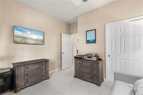 a kitchen with stainless steel appliances granite countertop a stove and a refrigerator