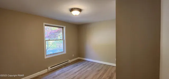 an empty room with a window