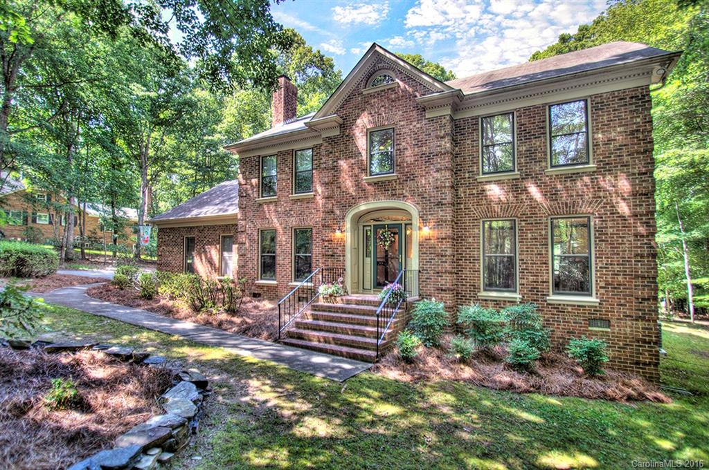 2733 High Ridge Road, Unit 15 Charlotte, NC 28270 - Photo 1 of 24 a front view of a house with garden