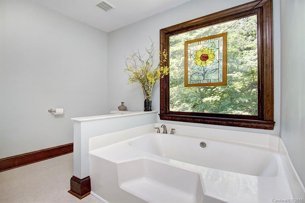 2733 High Ridge Road, Unit 15 Charlotte, NC 28270 - Photo 14 of 24 a white bath tub sitting in front of a window