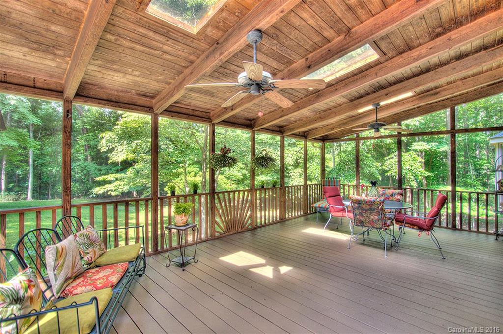 2733 High Ridge Road, Unit 15 Charlotte, NC 28270 - Photo 22 of 24 a balcony with furniture and wooden floor