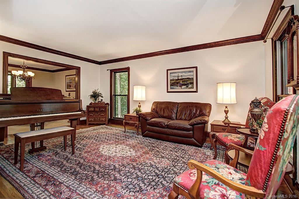 2733 High Ridge Road, Unit 15 Charlotte, NC 28270 - Photo 4 of 24 a living room with furniture and a piano