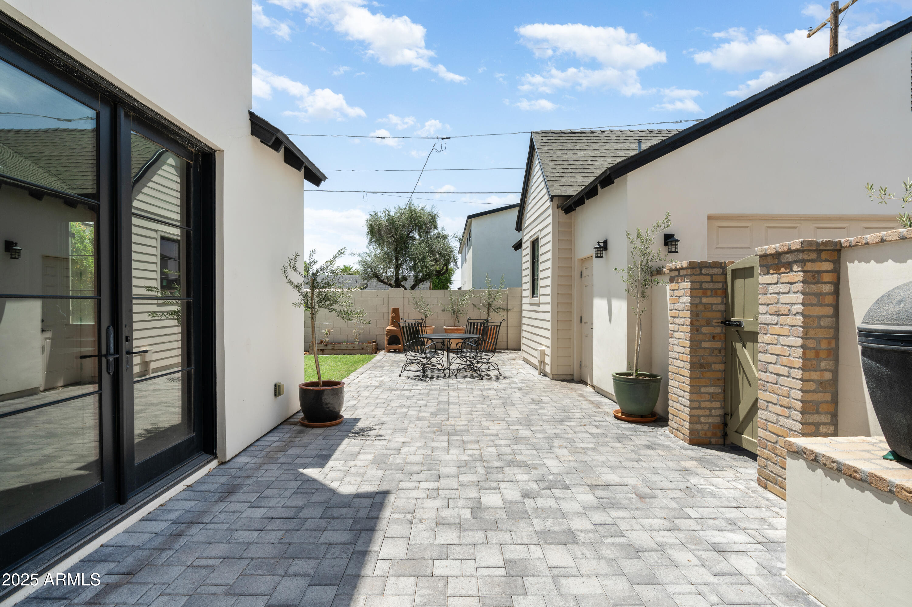 4901 East Amelia Avenue Phoenix, AZ 85018 - Photo 30 of 38 a view of a porch with furniture